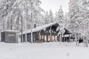 Naava - A cozy cabin with two saunas and hill views